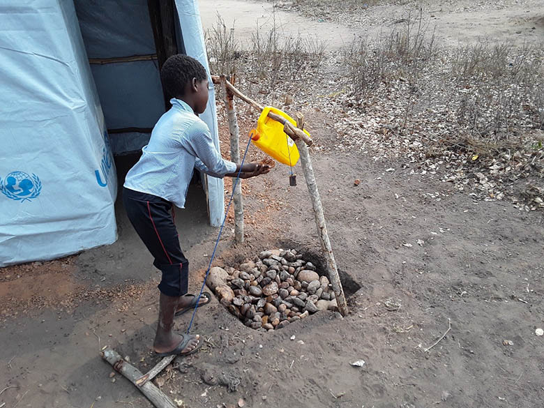 Cyclone Idai Mozambique child and latrine
