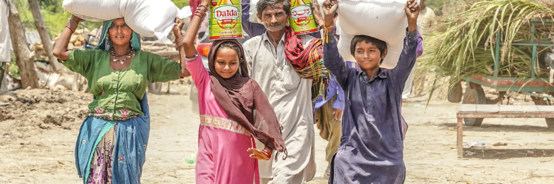 Family receiving aid in Pakistan