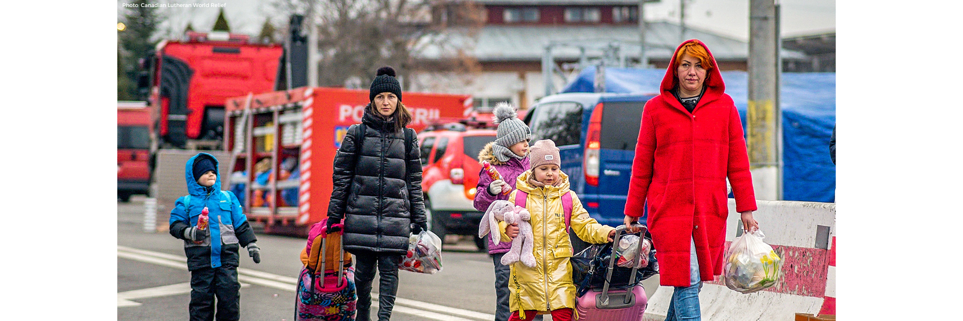 Ukrainian women and children fleeing their homes