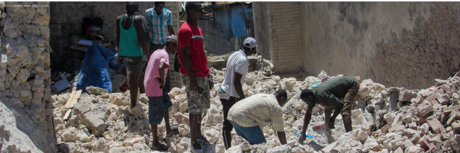 People searching through the rubble after the earthquake in Haiti