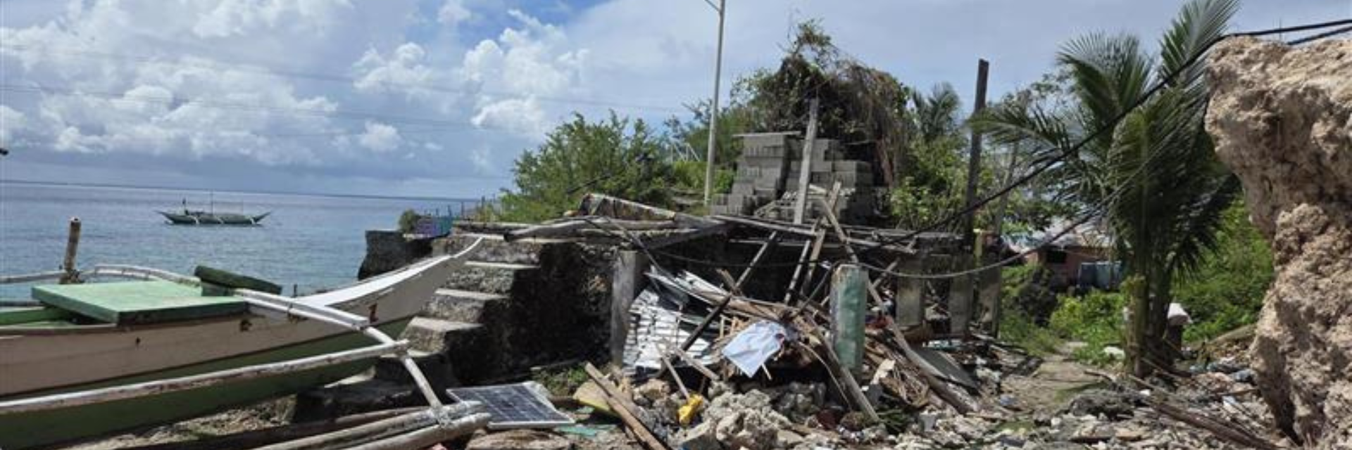 Destroyed buildings near the ocean