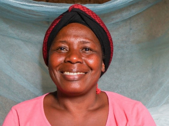 Woman smiling in front of camera