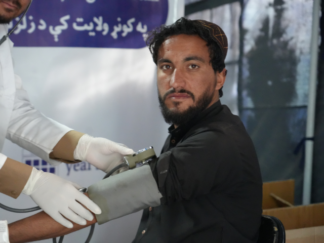 Hafizullah receiving medical attention at a health clinic set up by Islamic Relief Canada.