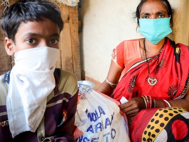 Mother and son with masks